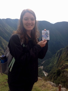 Kate Fuess holding seed packets at Machu Picchu 